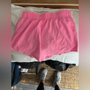 Pink running shorts